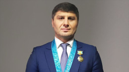 Подробнее о статье Титулованный казахстанский борец получил новую должность